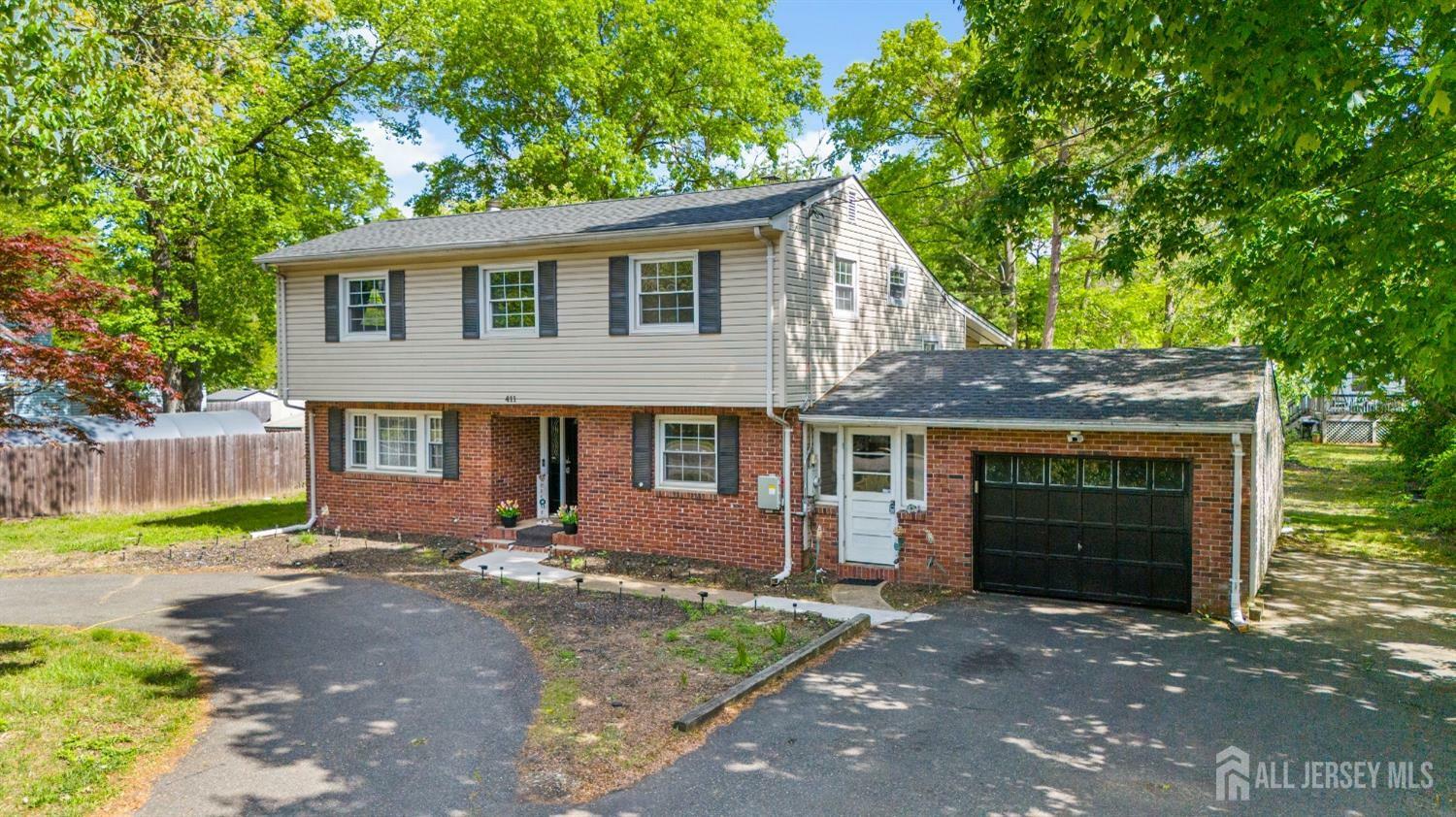 Property Photo: 411 Manalapan Road NJ 08884