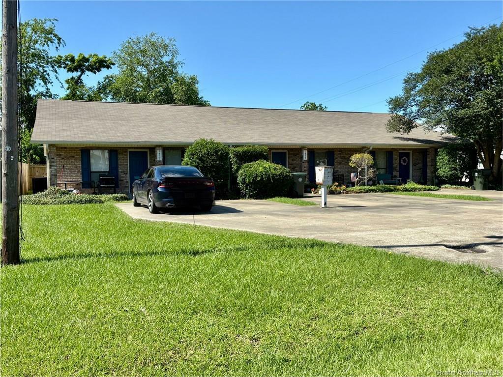 Property Photo: 1851 N Tallowood Drive LA 70605