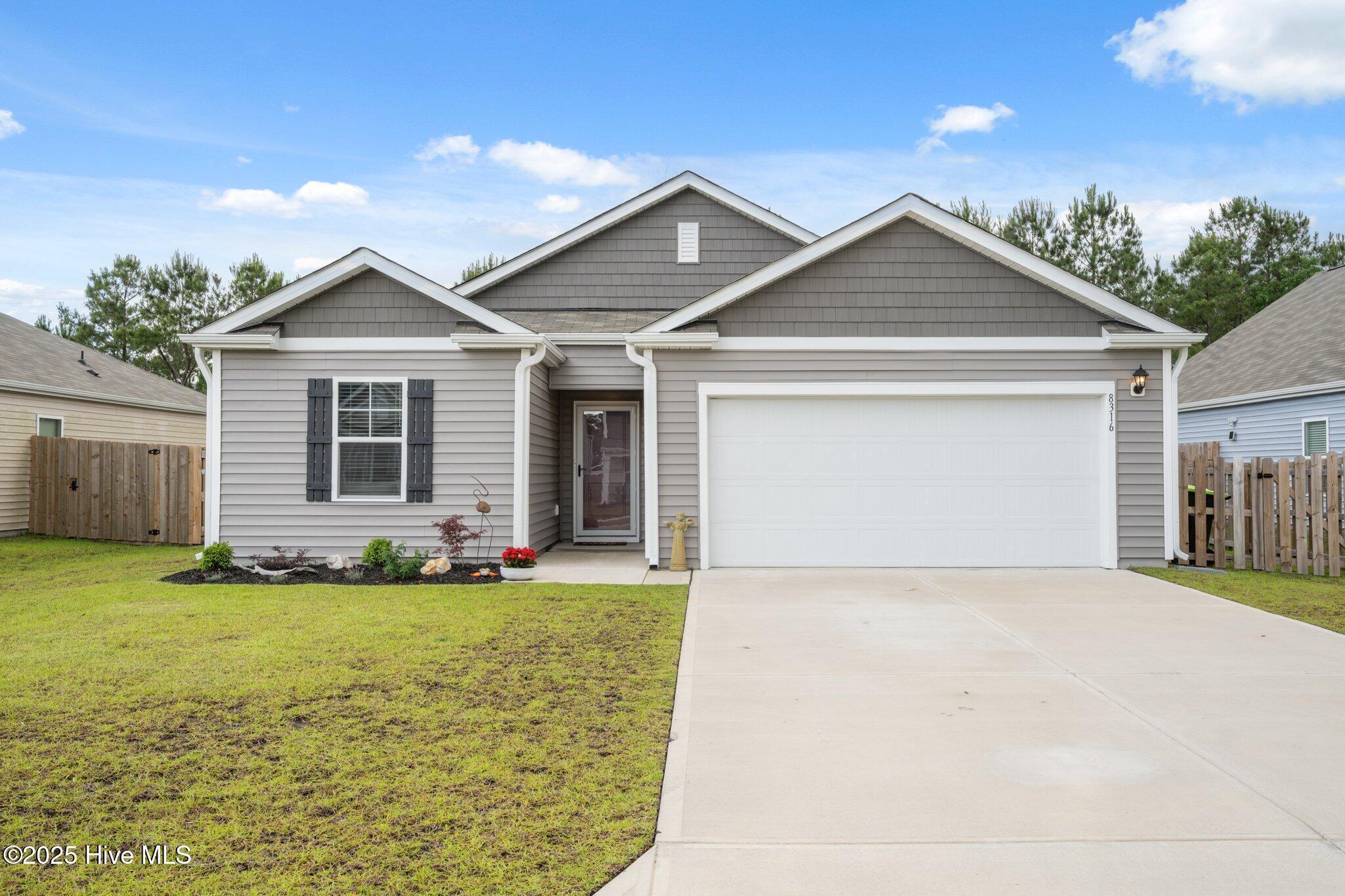 Property Photo: 8316 E Highcroft Drive NE NC 28451