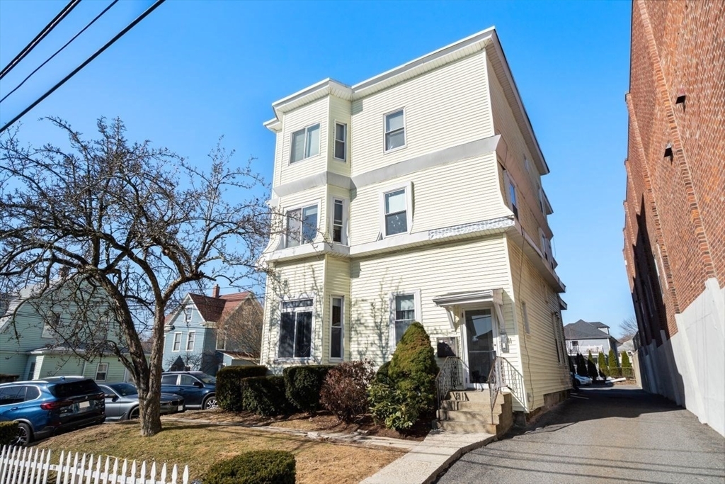 Property Photo: 11 Adams St 1 MA 02472