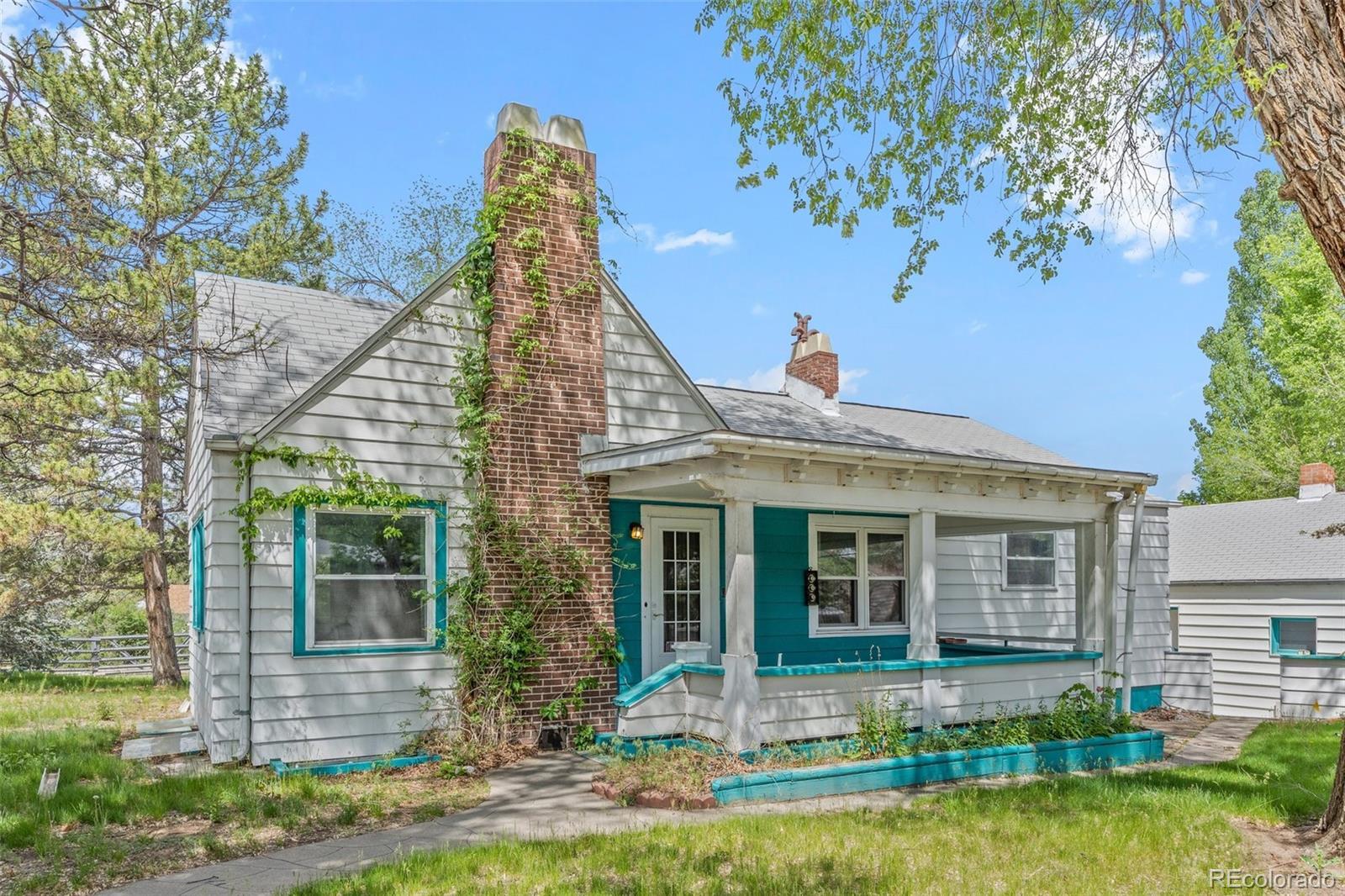 Property Photo:  701 W Quincy Avenue  CO 80110 