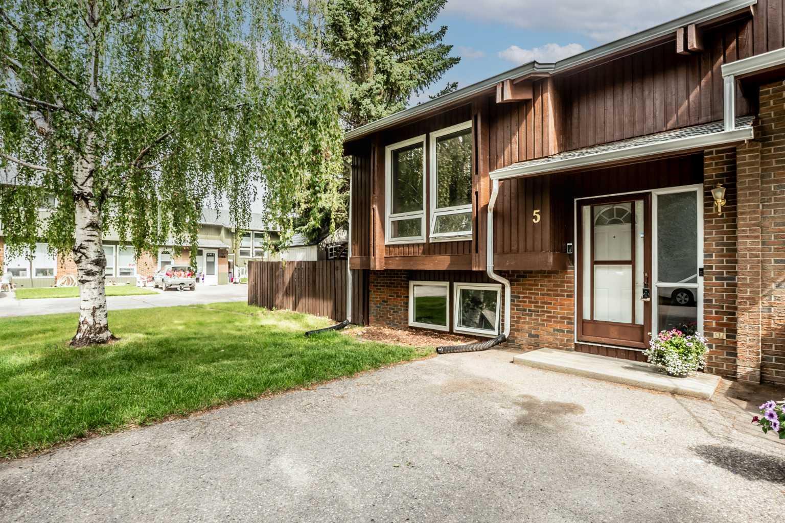 Property Photo: 5 Pekisko Road SW AB T1V 1C6