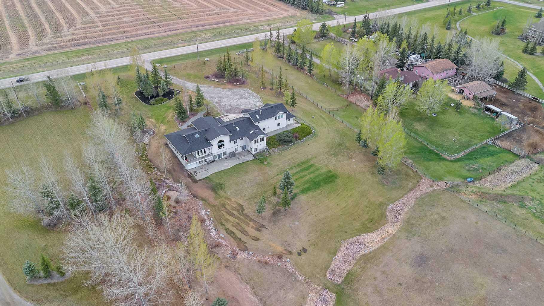 Property Photo: 250044 Range Road 32 AB T3Z 1G6
