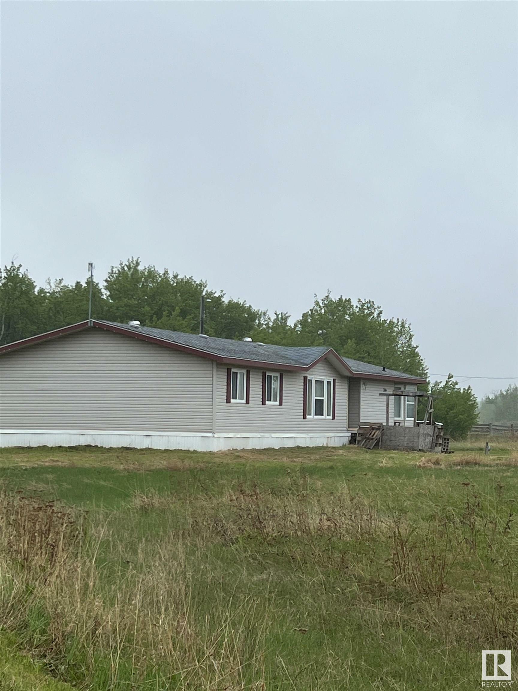 Property Photo:  14323 Township 592  AB T0A 3L0 