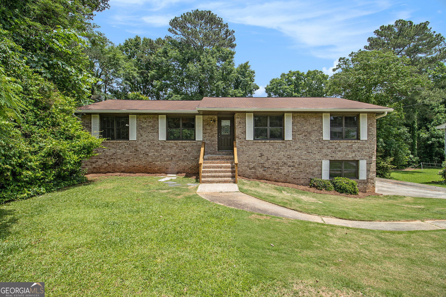 Property Photo:  530 Village Green Court SW  GA 30047 