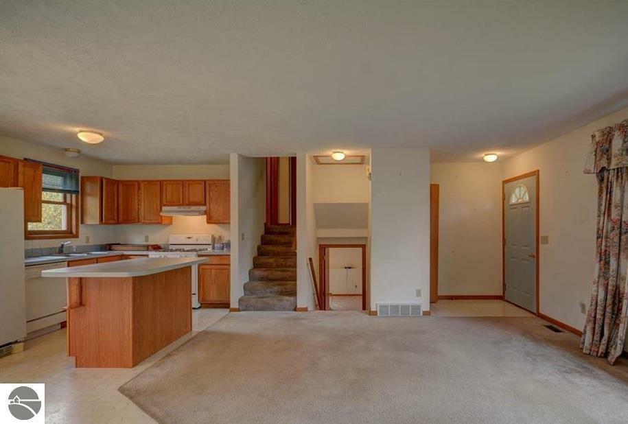 Property Photo:  327 Astro Drive  MI 49685 