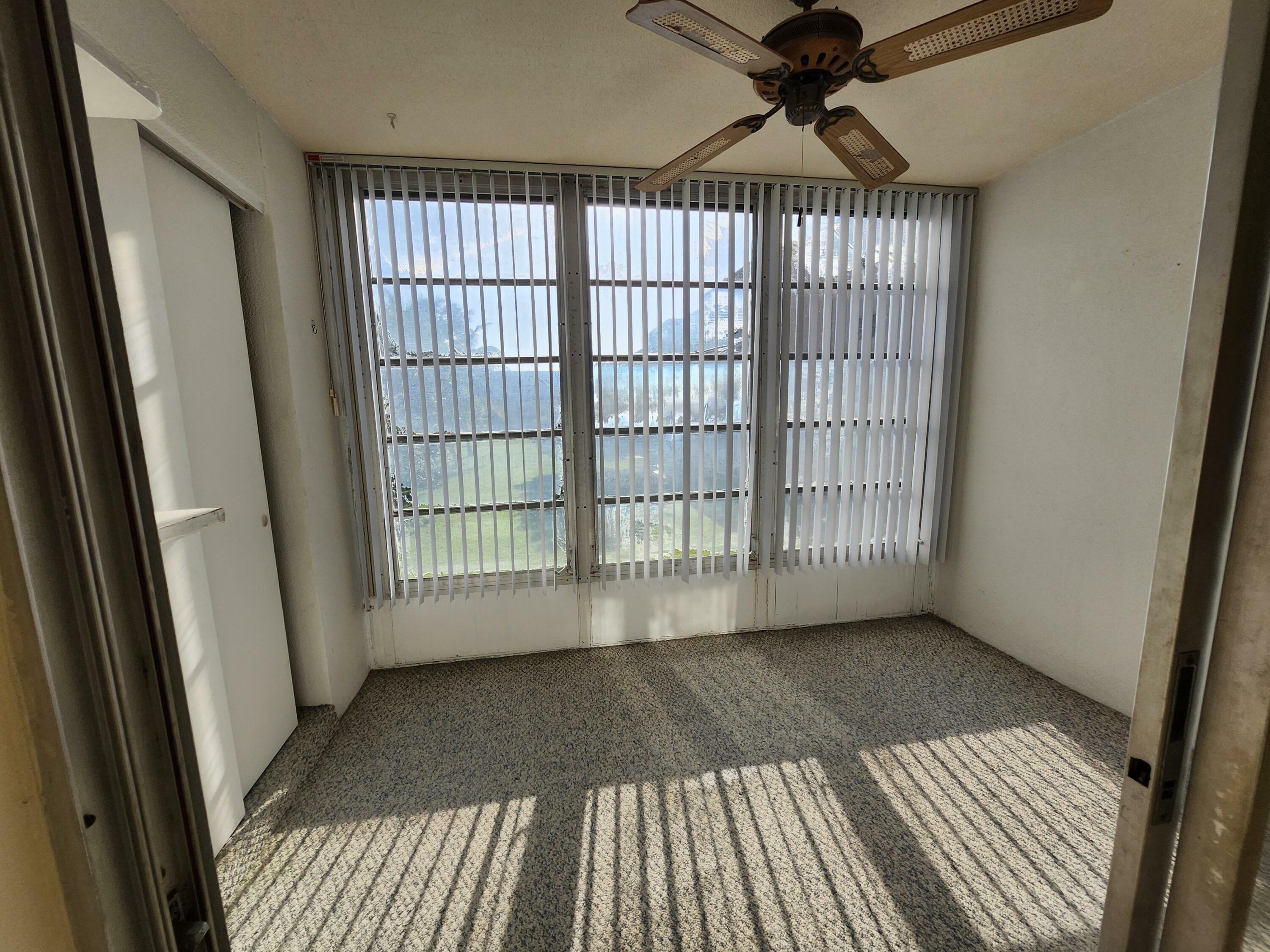 Property Photo:  230 NE 26th Avenue 216  FL 33435 