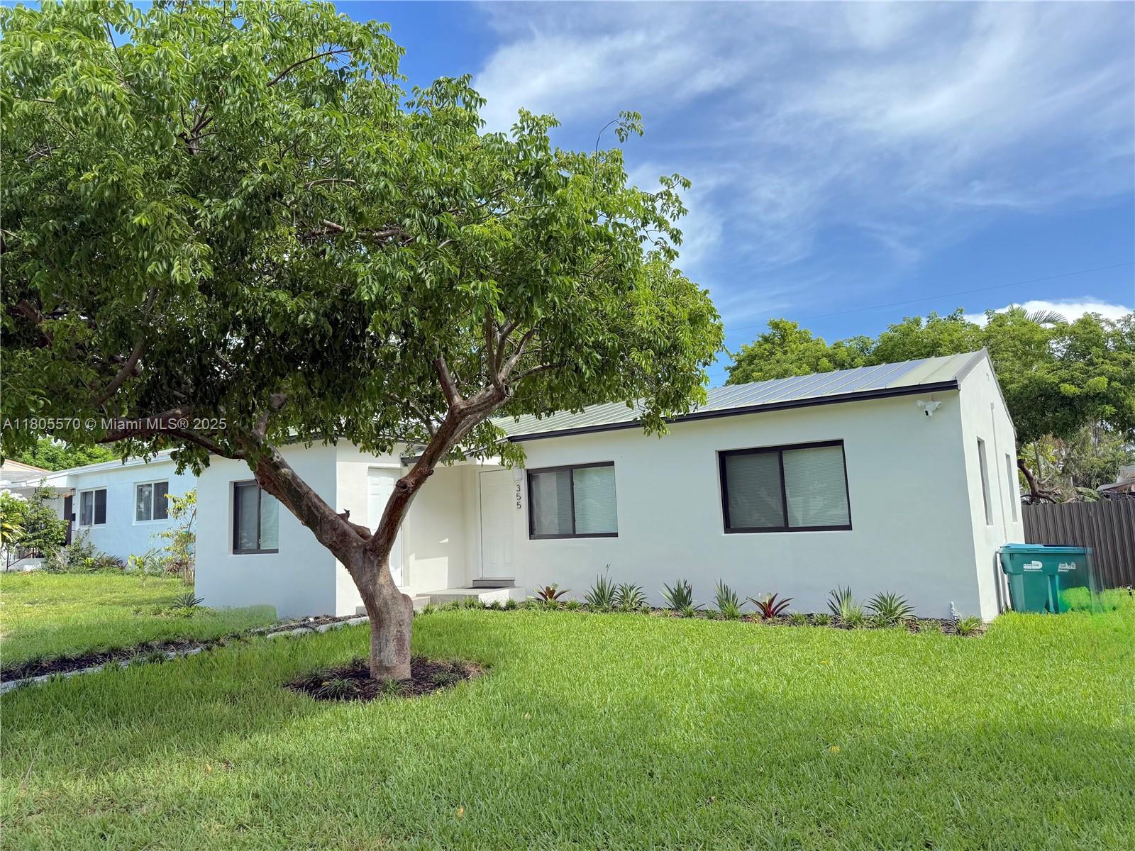 Property Photo: 355 NE 111th St FL 33161