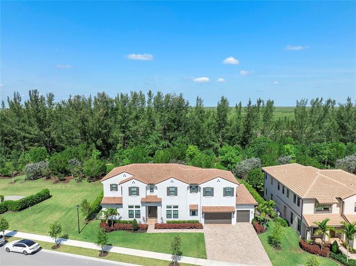 Property Photo:  9015 W Parkland Bay Trl  FL 33076 