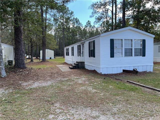 Property Photo: 64096 Mangano Road 154 LA 70452