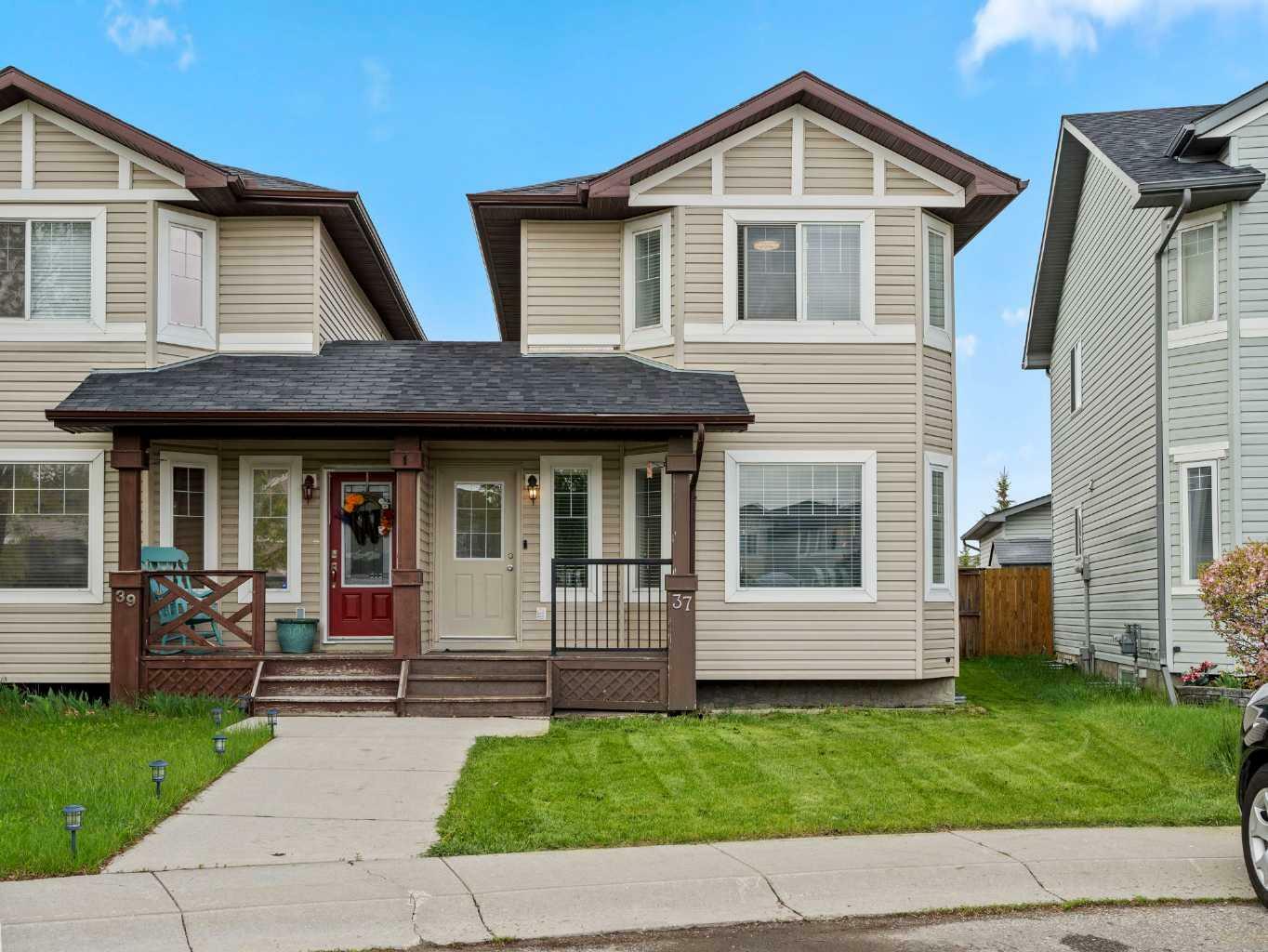 Property Photo: 37 Sunrise Loop SE AB T1V 2B2