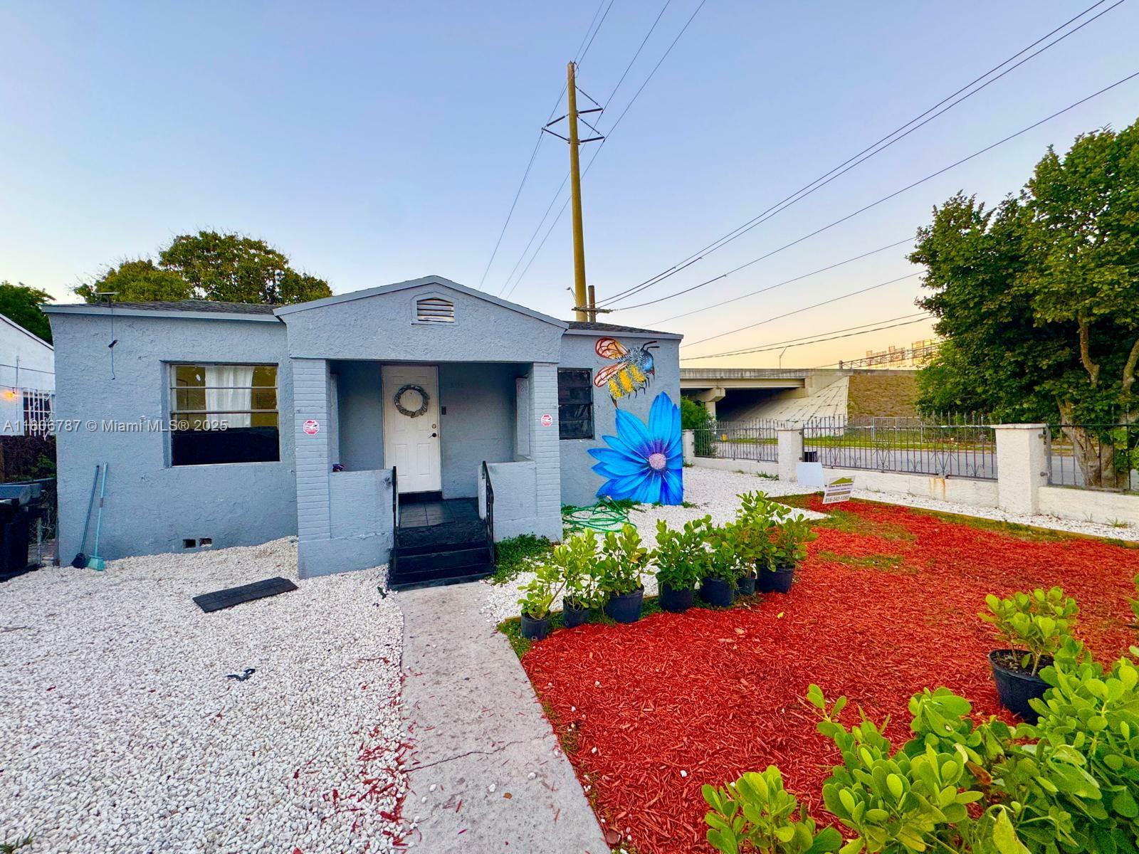 301 NW 37th St  Miami FL 33127 photo