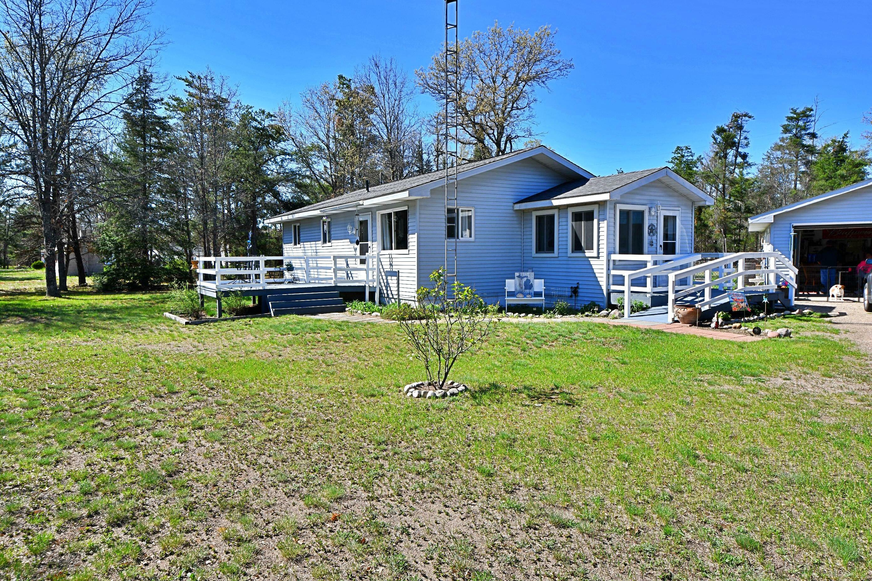 Property Photo:  2741 E M-72  MI 49738 