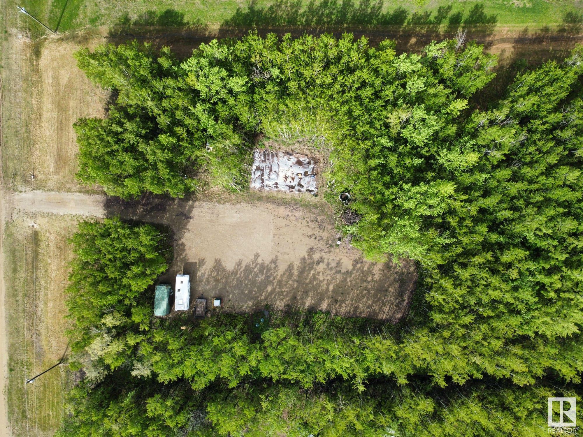 Property Photo: 205 473060 Rge Road 280 AB T0C 2C0