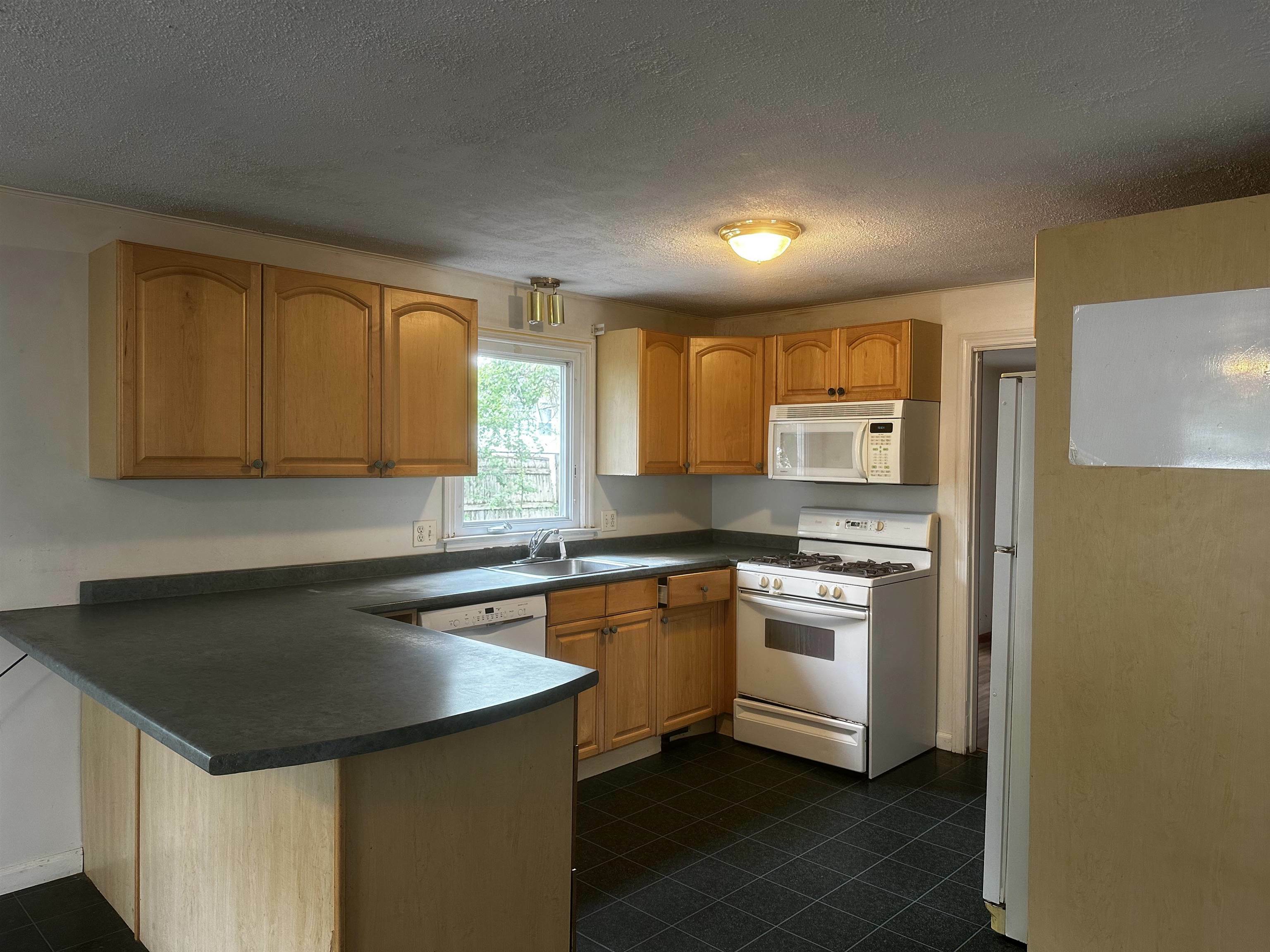 Property Photo:  23 April Drive  NH 03060 