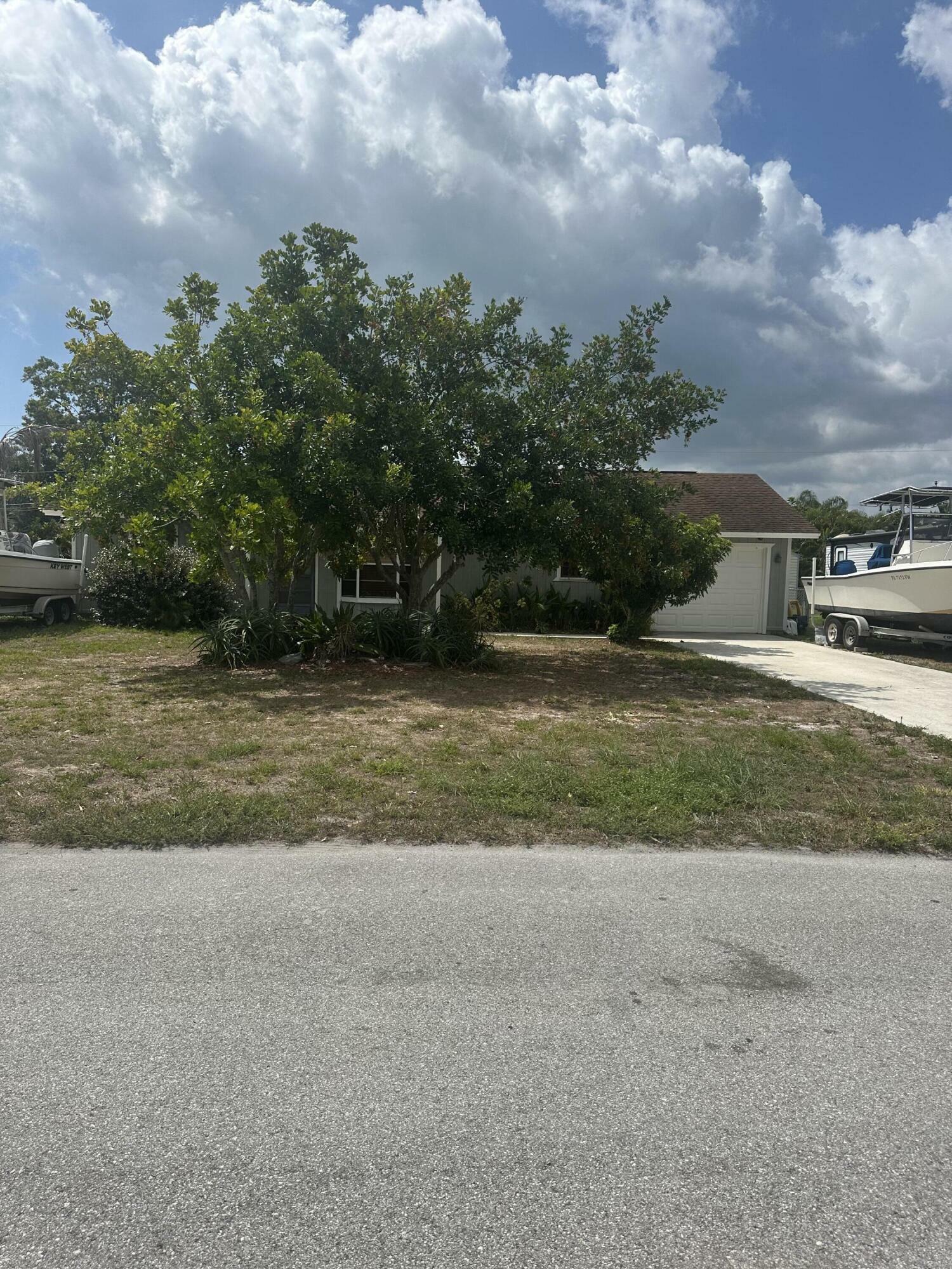 Property Photo: 6472 SE Sherwood Street FL 33455