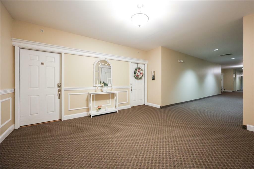 Property Photo: 1 Tupperware Drive 121 RI 02896