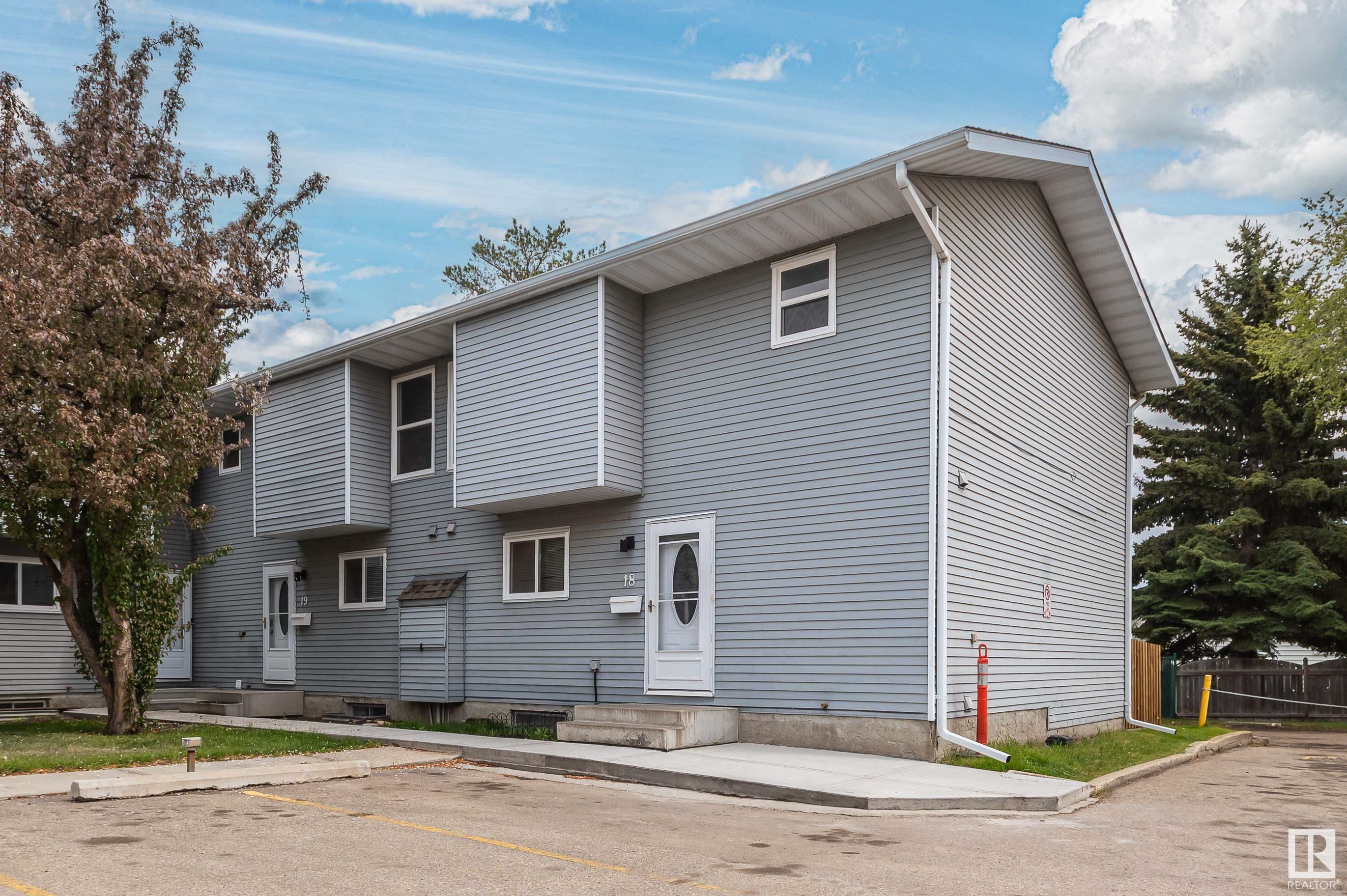 Property Photo: 4403 Riverbend Road NW 19 AB T6H 5S9