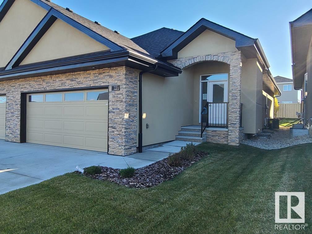 Property Photo: 104 Allard Link SW 22 AB T6W 2N2