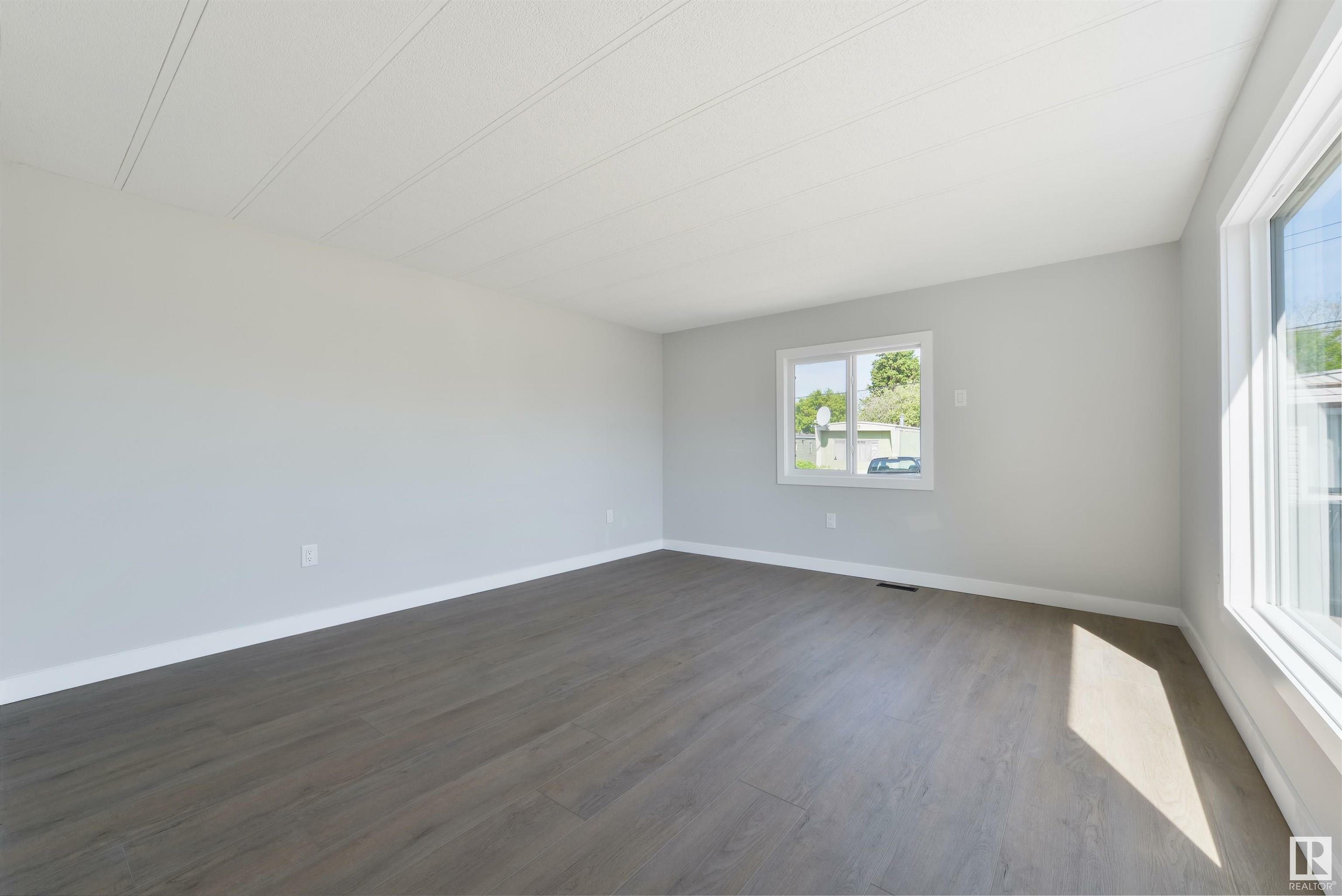 Property Photo: 305 Calahoo Road 100 AB T7X 3K6