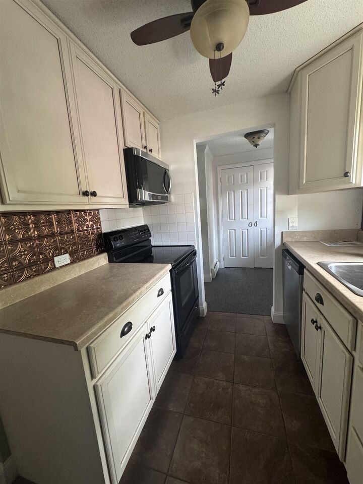 Property Photo: 11 Modena Drive NH 03303