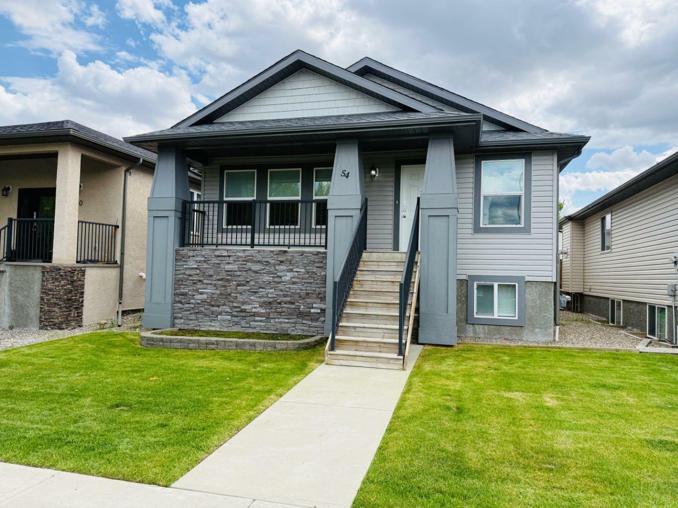 Property Photo: 54 Sunridge Boulevard W AB T1J 0T4