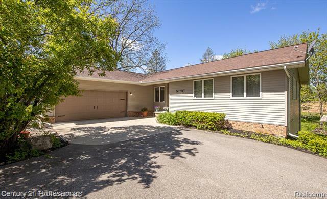Property Photo: 943 N Hacker Road MI 48843