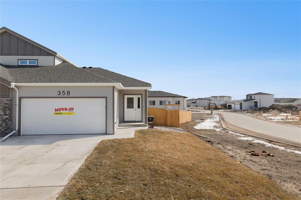 Property Photo: 358 Purvis Boulevard MB R1A 2P5
