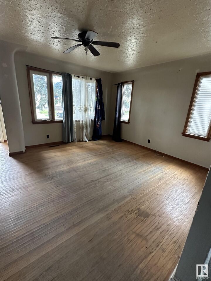 Property Photo:  12916 123A Street NW  AB T5L 0K9 