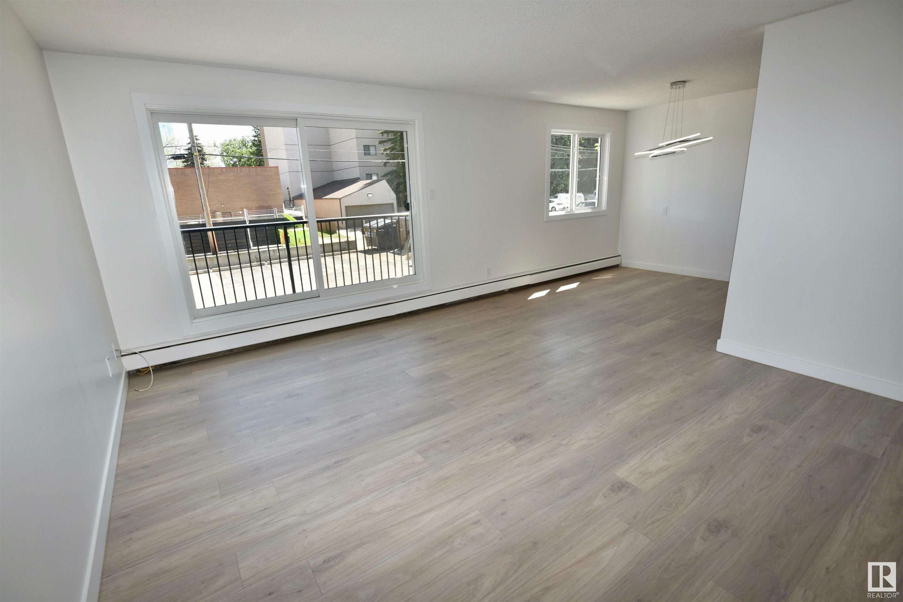 Property Photo: 10335 117 Street NW 202 AB T5K 1X9
