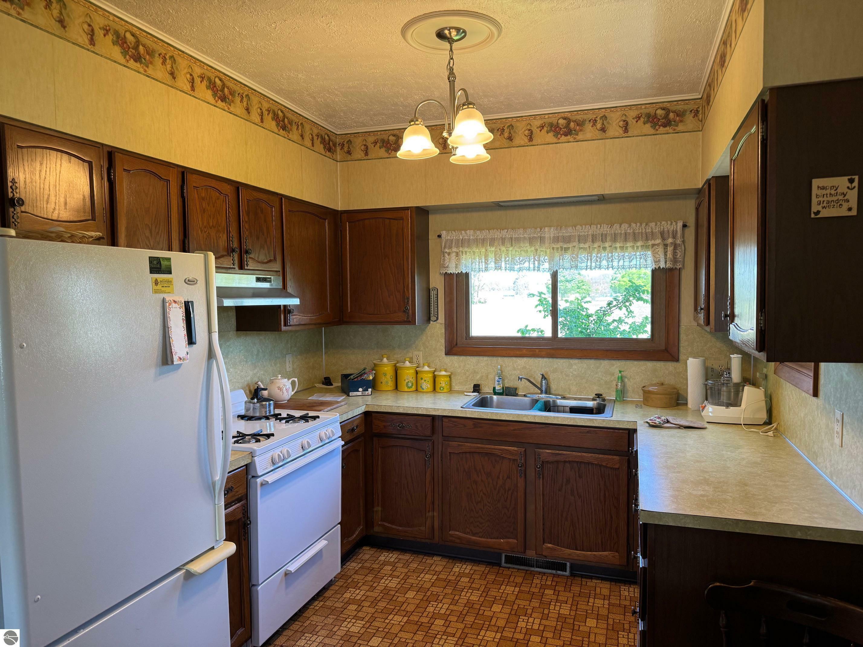 Property Photo:  8410 N Wise Road  MI 48617 