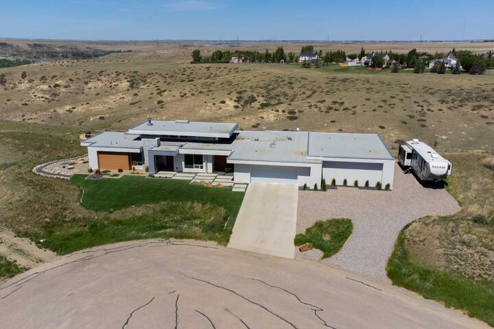 Property Photo: 403 Meadow Lark Drive AB T1J 5R8