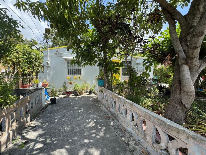Property Photo:  151 NW 64th St  FL 33150 