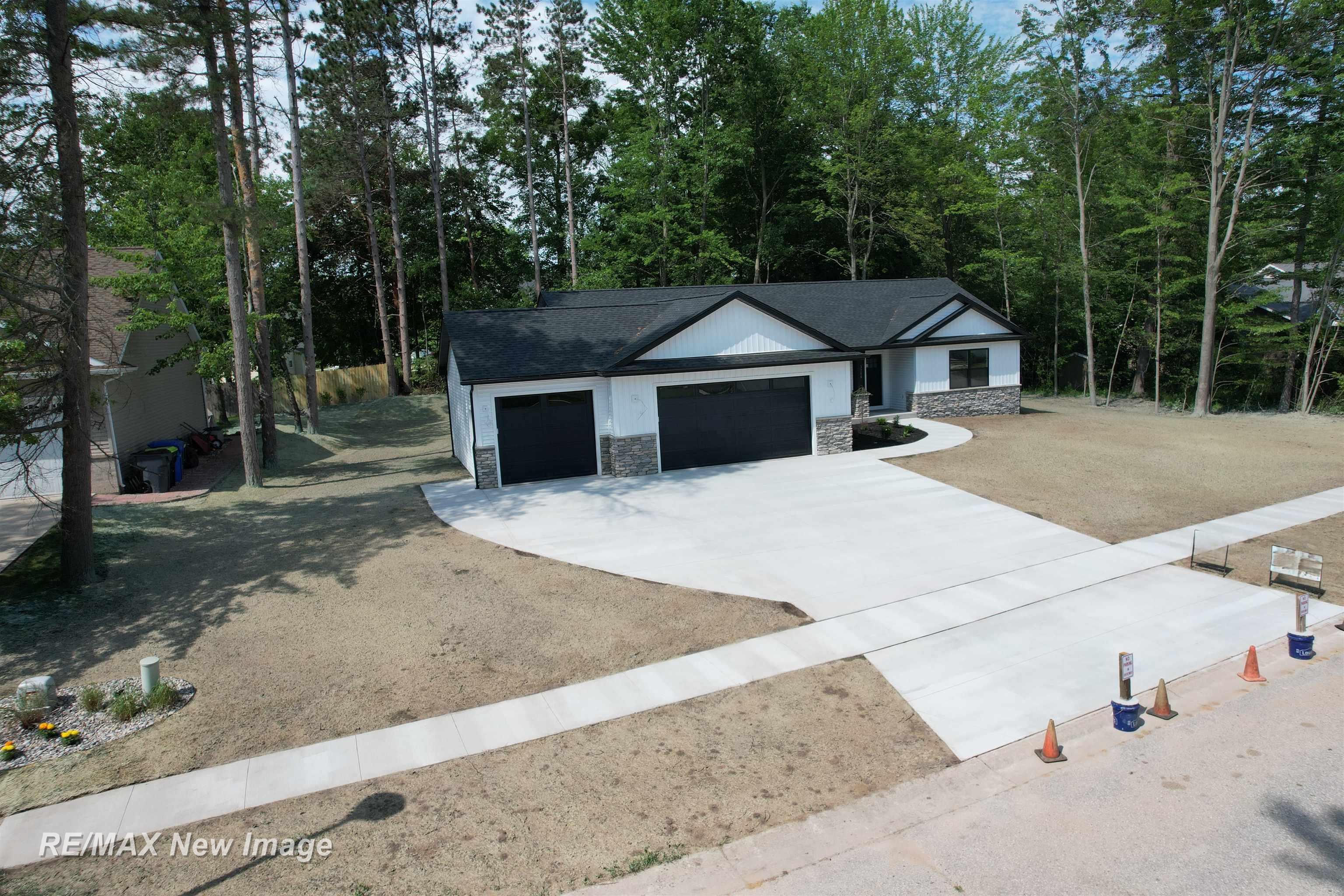 Property Photo:  3706 Bobcat Court  MI 48642 