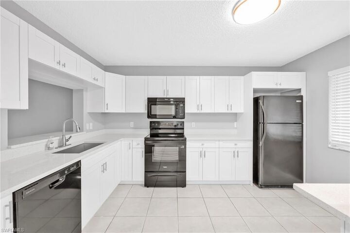 Property Photo:  7791 Esmeralda Way L103  FL 34109 