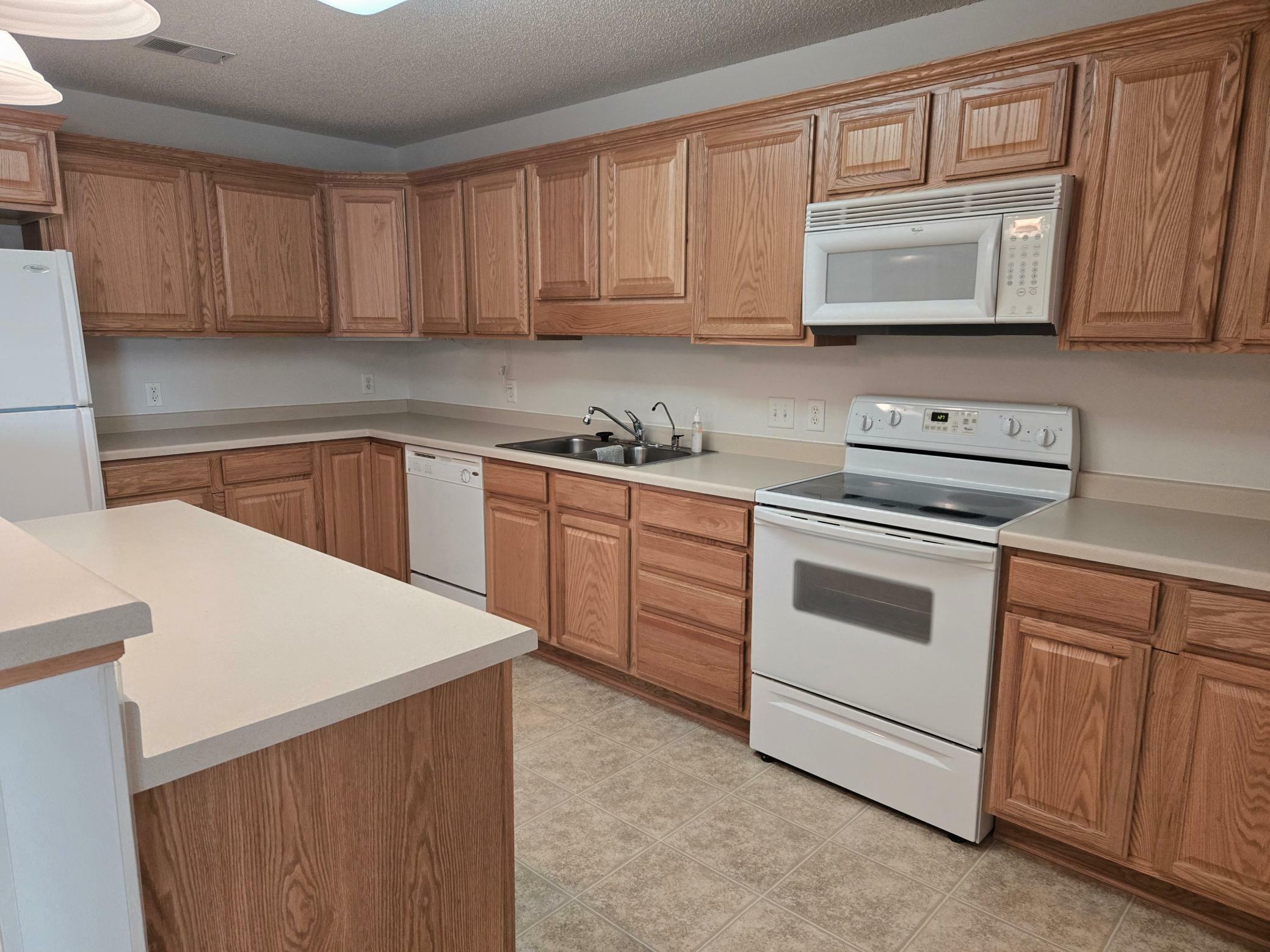 Property Photo: 15631 Linnet Street NW 3-208 MN 55304