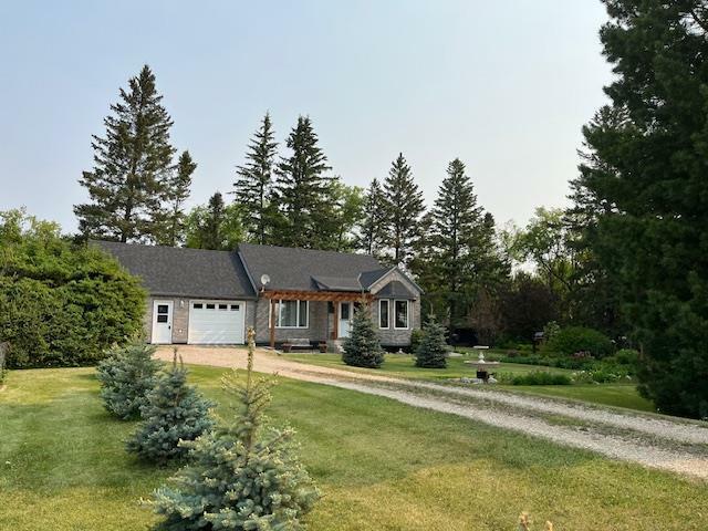 Property Photo: 163079 114N Road MB R0J 1W0
