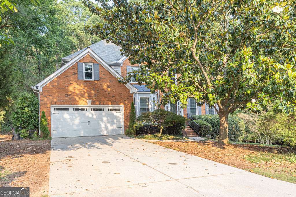 Property Photo:  1253 Rivermark Court  GA 30043 