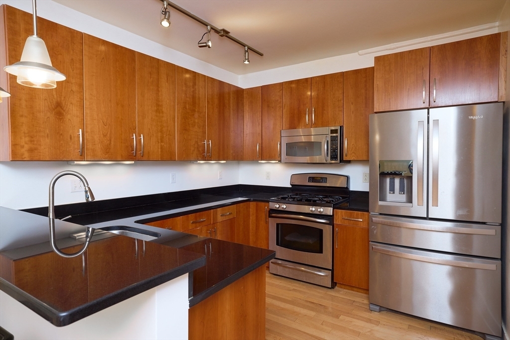 Property Photo:  24 Bay State Rd 7  MA 02138 
