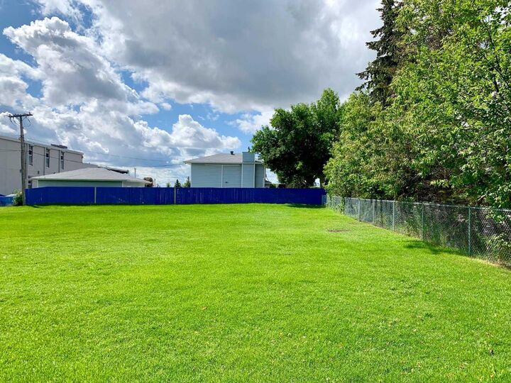 Property Photo: 8, 10, 12, 14 Cymrie Street NW AB T2K 1W6