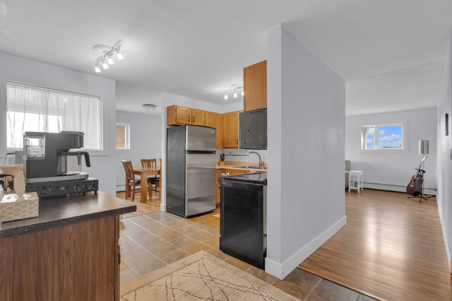 Property Photo:  7031 Gray Drive 302  AB T4P 2B1 
