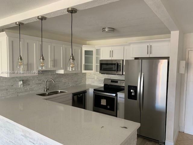 Property Photo: 6990 NW 186th St 4-409 FL 33015