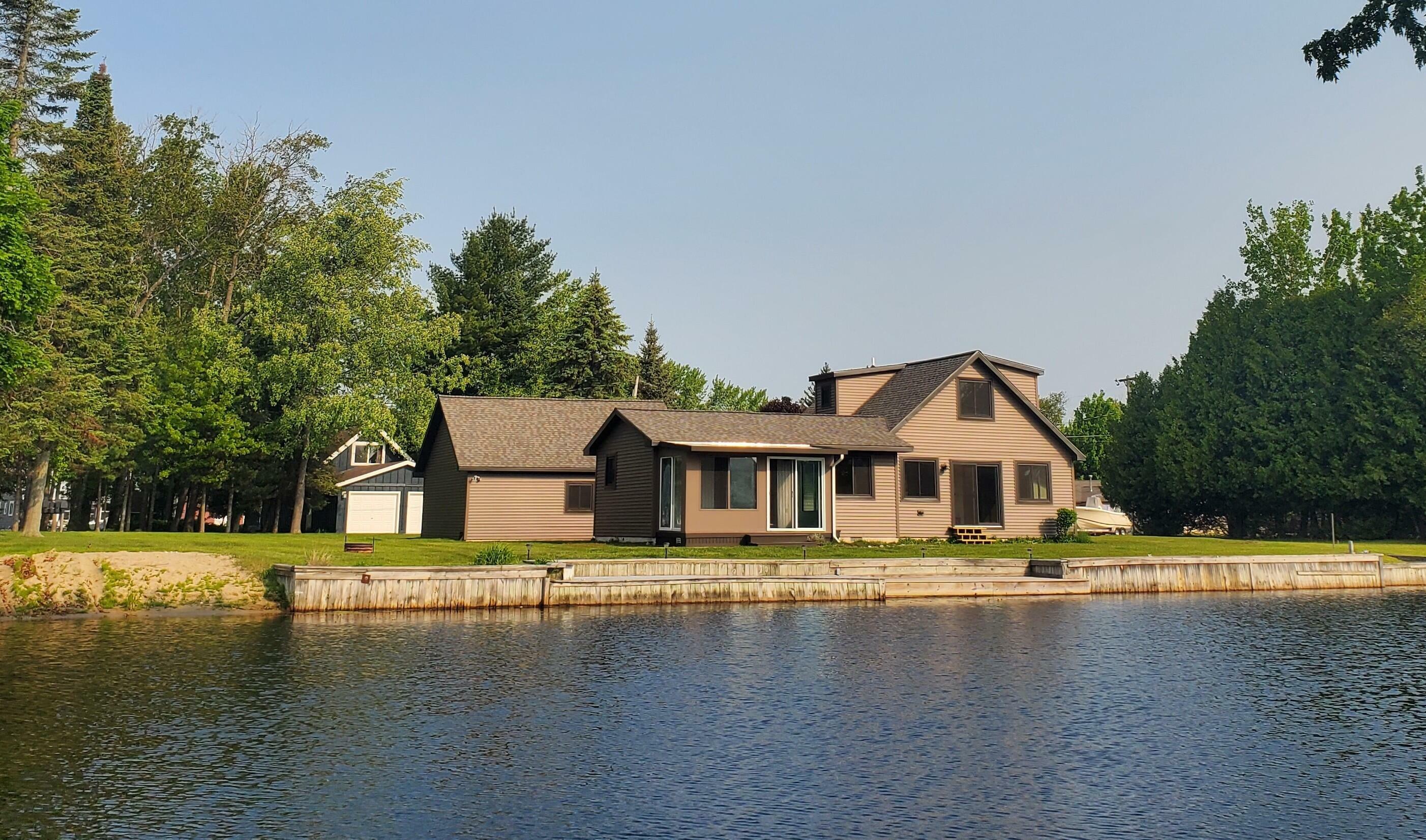 Property Photo:  115 Choctaw Trail  MI 48651 