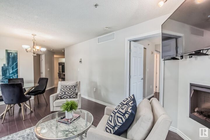 Property Photo:  10118 106 Ave NW 115  AB T5H 0B8 
