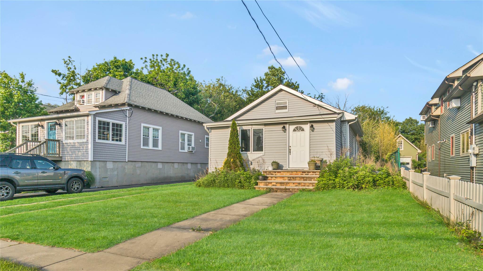 Property Photo: 9 E Hamilton Avenue NY 11758