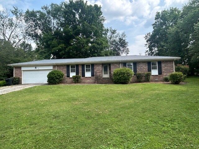 Property Photo:  203 Arnold Ave  TN 37388 