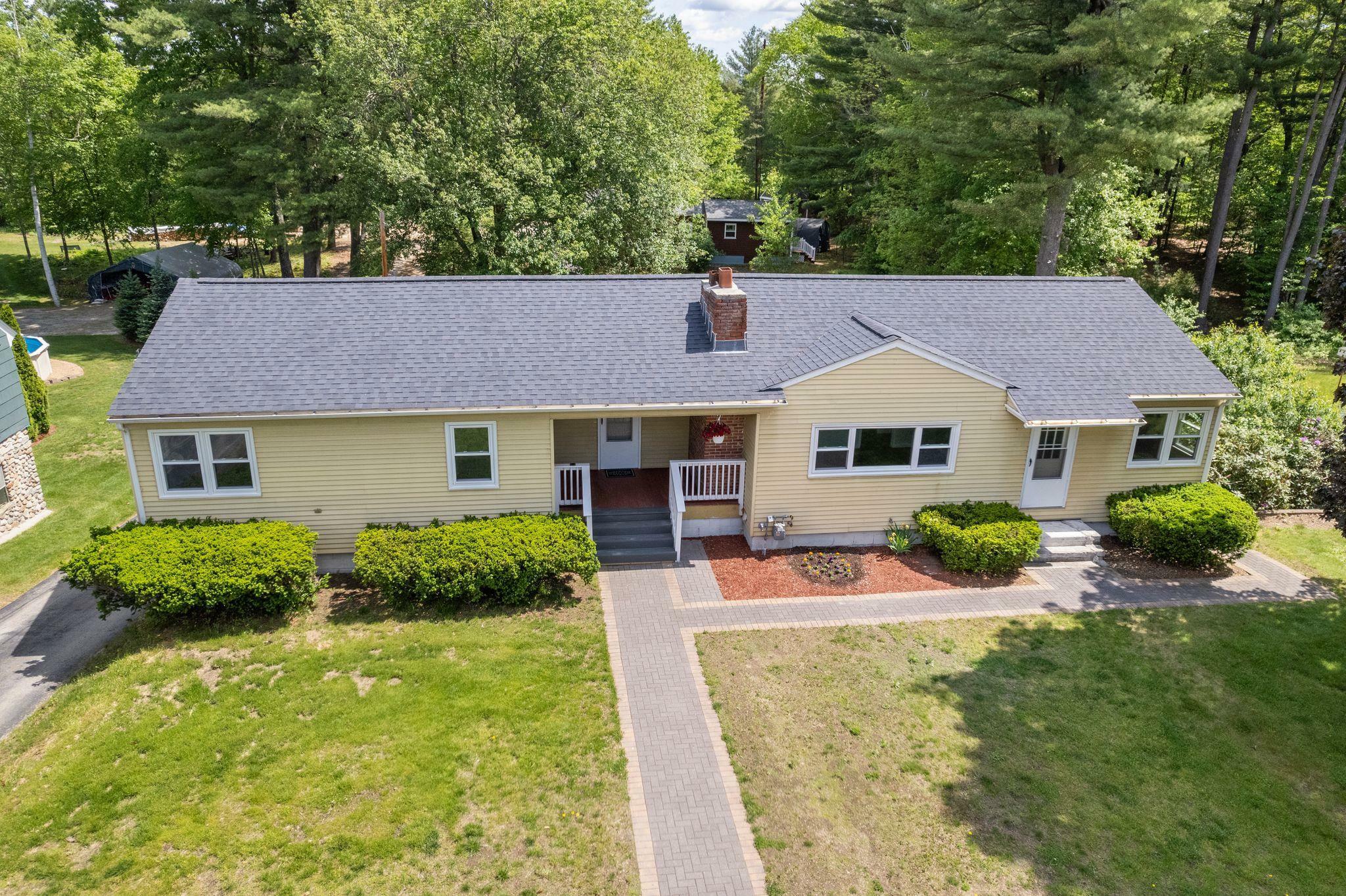 Property Photo:  513-515 Mast Road  NH 03045 