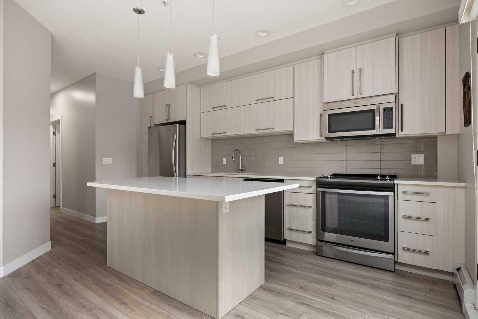 Property Photo: 93 34 Avenue SW 309 AB T2S 3H4