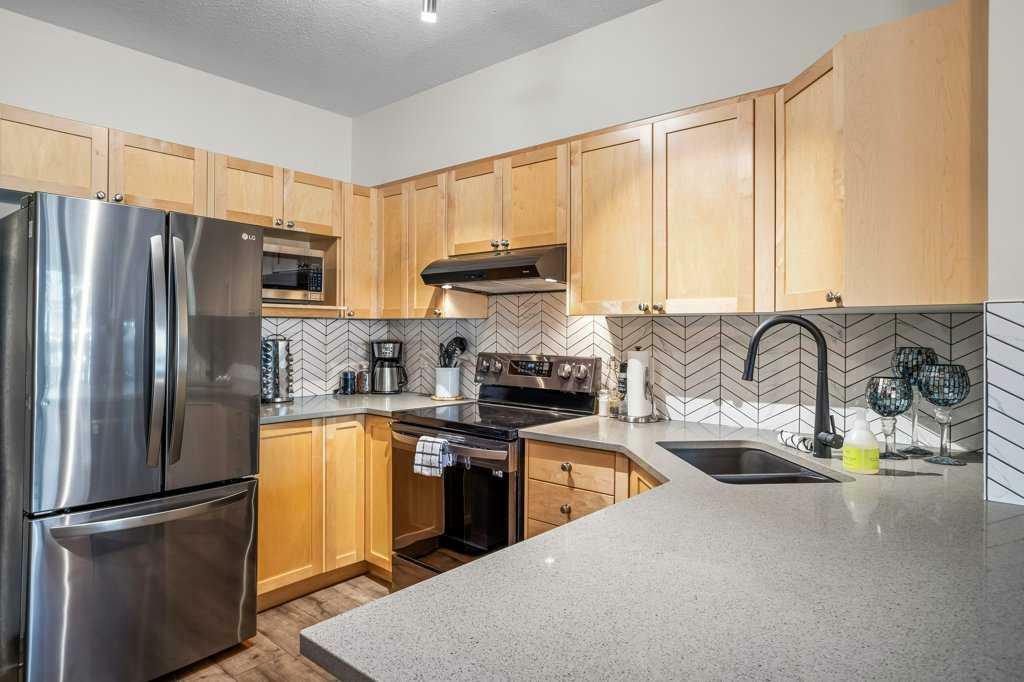 Property Photo: 109 Montane Road 201 AB T1W 3J2