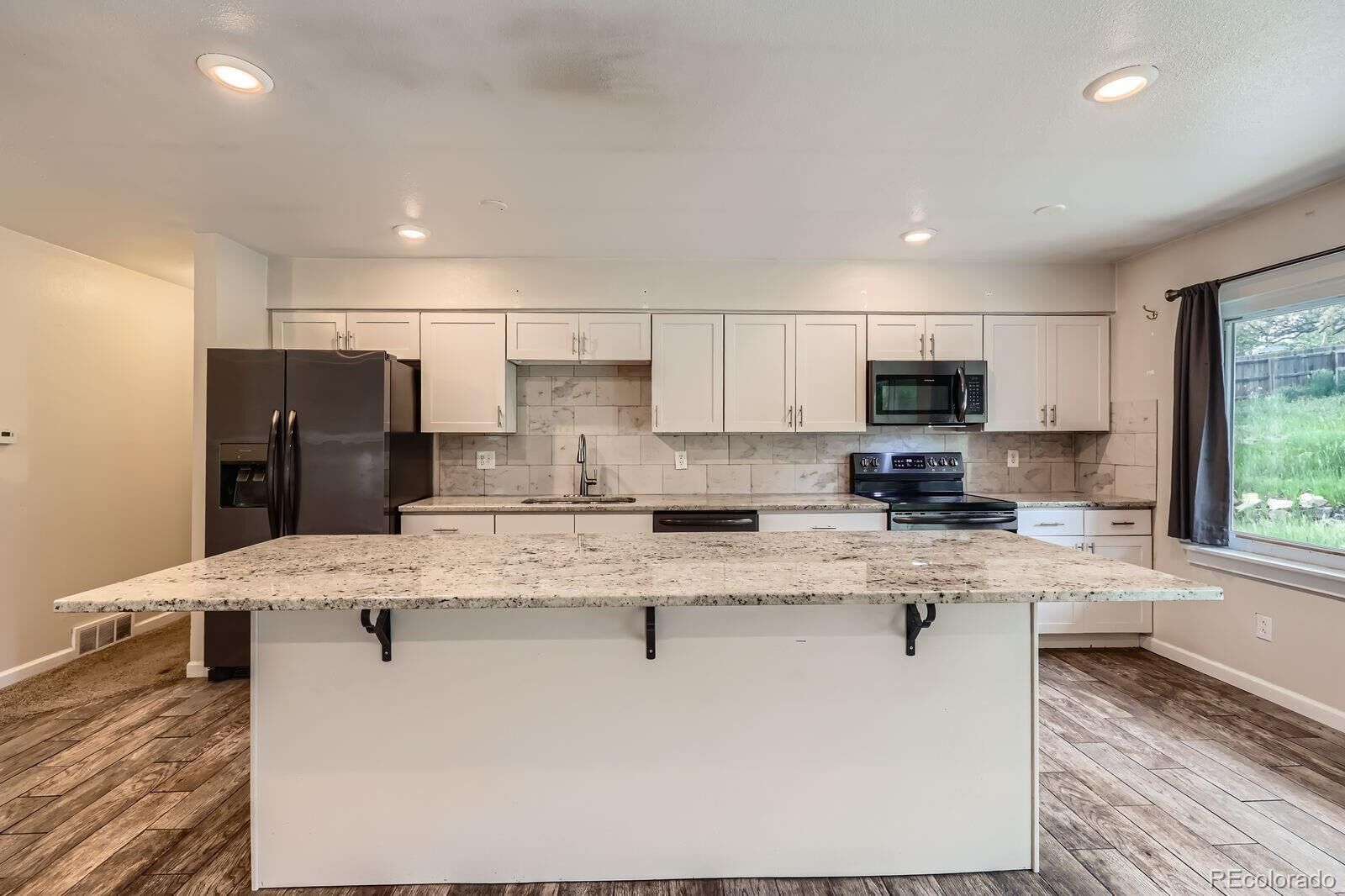 Property Photo: 679 S Pearl Street CO 80107